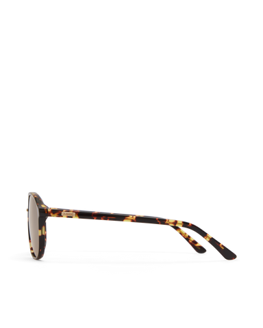 Women's aviator sunglasses in amber tort colourway featuring an oversized modified aviator silhouette with flat-top brow bar, double bridge, angular navigator-inspired shaping, and slim arms for a bold, contemporary look with full coverage.