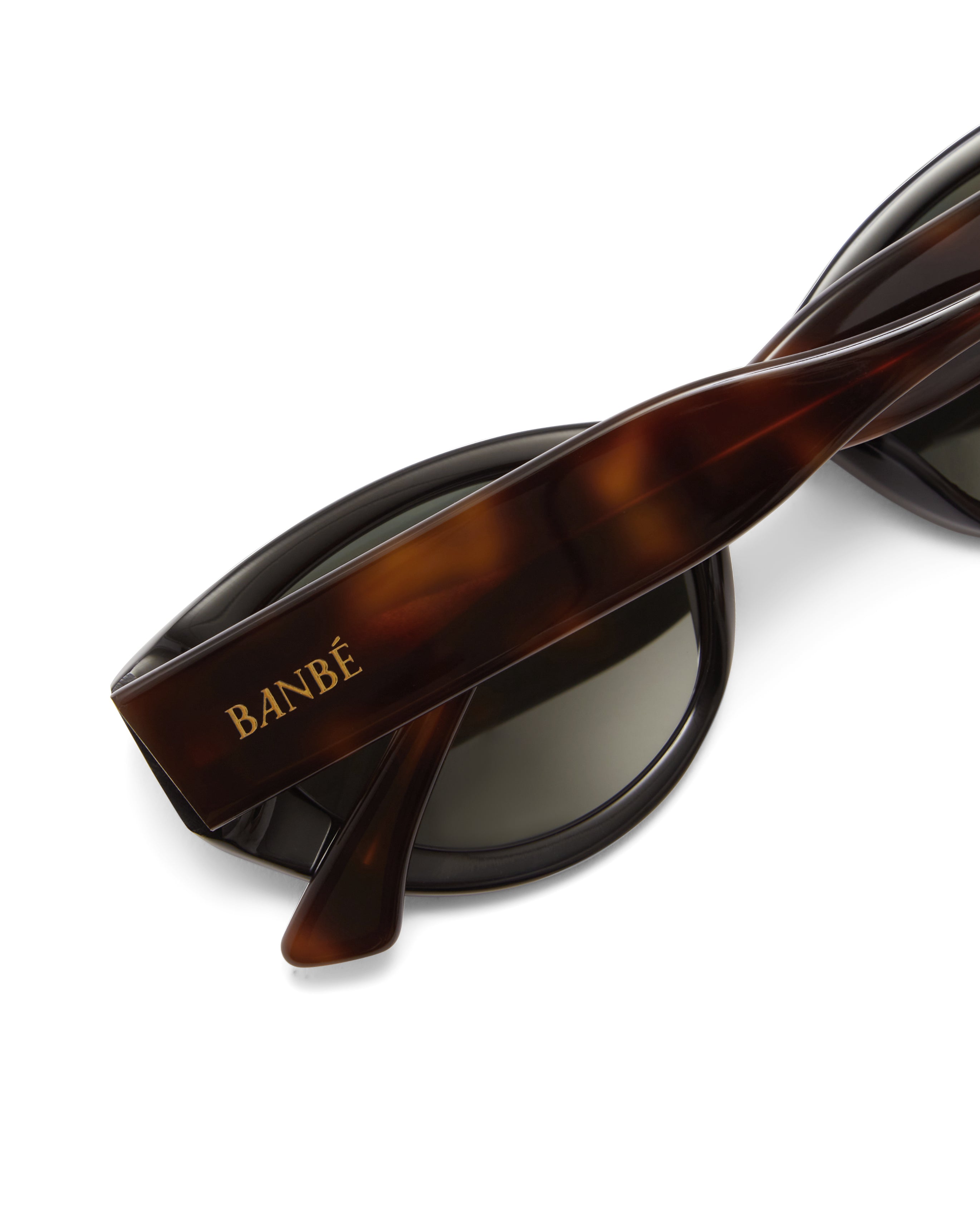 Women’s tortoiseshell cat-eye sunglasses with chunky acetate frame, tinted lenses