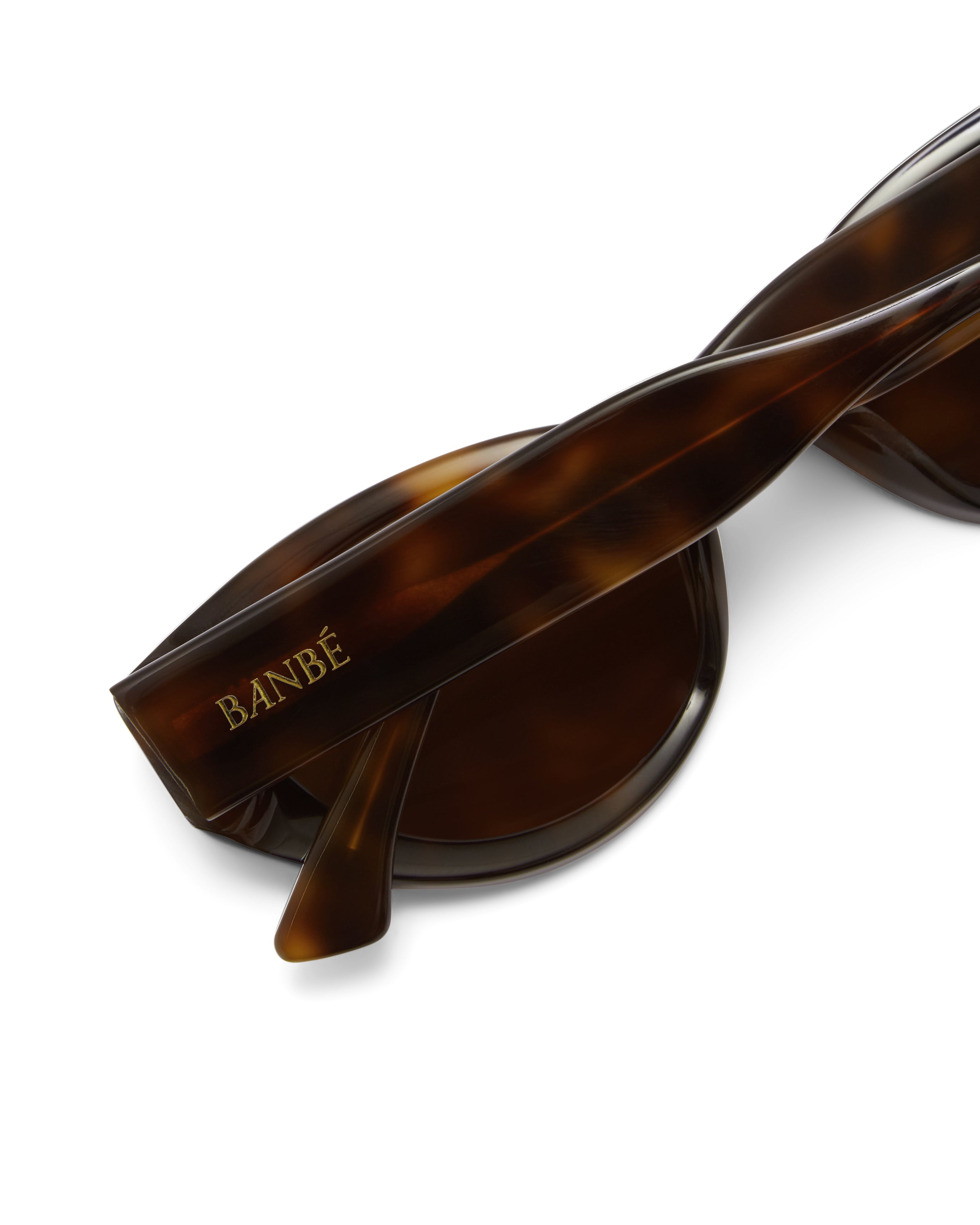 women's sunglasses with thick sculpted brown cat-eye frames with a bold statement silhouette