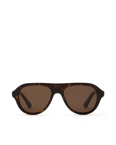 Oversized tortoiseshell aviator frame, designed with a bold, architectural silhouette that blends vintage influence with a modern edge.