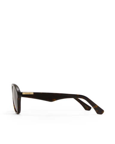 Oversized tortoiseshell aviator frame, designed with a bold, architectural silhouette that blends vintage influence with a modern edge.